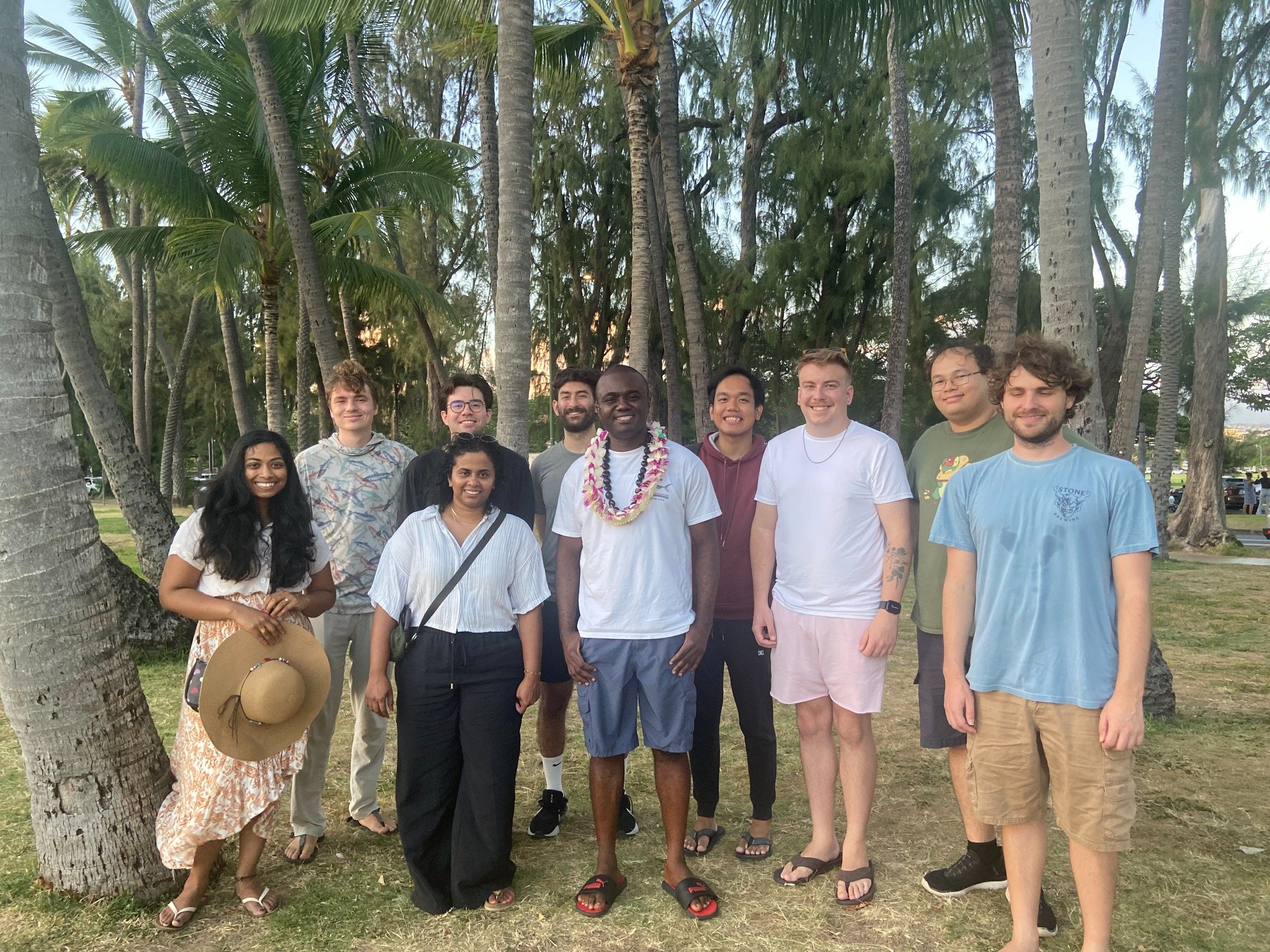 Student group among palm trees